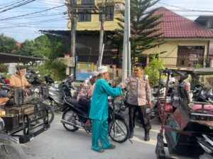 Sapa Pengguna Jalan, Polres Tanjungbalai dan TK Kemala Bhayangkari Bagikan Takjil Gratis 2 IMG 20260224 WA0150